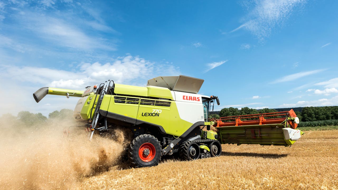 brand-03 A CLAAS LEXION combine harvesting wheat in Höxter, Germany.